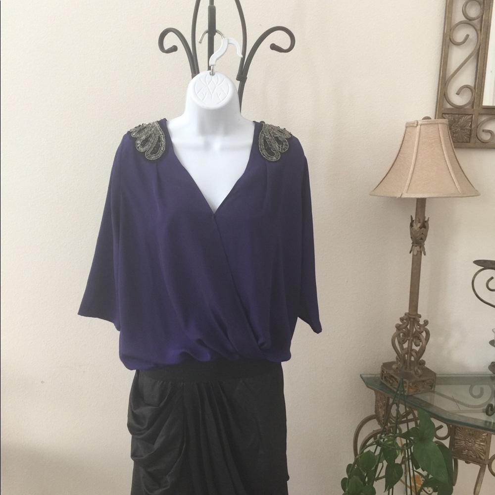 A true purple blouse with decorative sequins Sz S